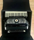 Beauty Titano Palmer Converter Virtuoso Accordion W/straps, Case & Cover - Italy Used. Price: $2995.00.