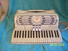 Titano Ideal Accordion White Tube Chamber Model 17" Accordian Good Used Cond.. Price: $450.00.