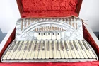 Titano Special 5814 41-KEY 120-BASS Accordion Made In Italy Grey Pearl Case Used. Price: $749.99.