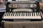 Universal Accordion Model 45115 - Excellent Condition With Case Used. Price: $2895.00.