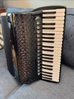 Jet-black Piano Accordion For Sale Open. Price: $8999.00.