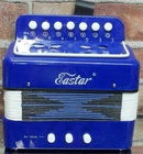 Eastar Kids Accordion Toy Accordian Mini Musical Instruments 10 Keys Button Used. Price: $37.94.