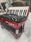 Hohner Bravo Iii 72 Bass Piano Accordion Red Pearl Open. Price: $640.00.
