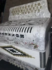 Rossetti Fbe Button Accordion White Used. Price: $700.00.