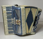Pearl Blue & White Noble Starlet Piano Accordion Lm (41 KEY/120 Bass) Italy Used. Price: $849.95.