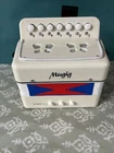 Vintage Mugig Kids 7 Key Accordion Musical Instrument Handheld Player! Used. Price: $31.99.