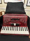 Hohner Hohnica 1305 72 Bass Piano Accordion Pearl Red Carry Case Open. Price: $685.74.
