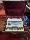 Scandalli 41 Key Blue Pearl Tone Model 40929 Accordion & Case Used. Price: $525.00.