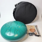 Yasisid 12 Inch Steel Tongue Drum With Music Book Used. Price: $45.95.