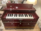 Banjira Standard Harmonium Mahogany Wood 32 Keys Multi-fold Bellow Stops Used. Price: $300.00.
