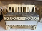 Vintage 1930S Wurlitzer Lyric Piano Keyboard Accordion Works. Price: $175.00.