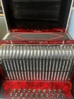 Alacran Red Accordion 31 Buttons 12 Bass Keys With Case Used. Price: $800.00.