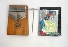 Kalimba Wooden Thumb Piano Key Model W-17T With Accessories Used. Price: $21.99.