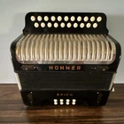 Rare Hohner Erica Button Accordion 21 TREBLE/8 Bass, Register, Black/silver Ad Used. Price: $645.00.