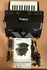 Roland FR-1X Piano-type V-accordion Black + Backpack Style Carrying Case Used. Price: $1650.00.