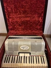 Vintage Cellini Accordion 164/130 Made Italy Full Size W/ Case Pearl Finish Used. Price: $300.00.