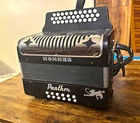 Hohner Panther Button Accordion 31 TREBLE/12 Bass Register Black/silver/red Used. Price: $424.99.