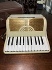 Vintage Camerano 25 Key 12 Bass Accordion With Case Mother Of Pearl Used. Price: $225.00.