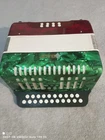 Mirage 2-ROW Diatonic Accordion With 8 Bass Buttons Mexican-flag Finish Used. Price: $499.00.