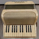 Vintage German Made Student Accordion 12 Bass Pearl Ivory Gold Tone Guild Is Used. Price: $125.00.