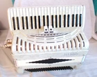 Titano Accordion White Dandy Model 17" Accordian Very Good Lightly Used Cond.. Price: $525.00.