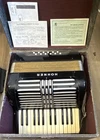German Hohner 312/25/12 Black Piano Accordion Treble 24 Bass Buttons W/ Case Used. Price: $600.00.