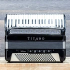 Titano Model Virtuoso 120-BASS 41-KEY 11-TREBLE Switch Piano Accordion W/case Used. Price: $1899.99.