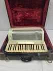 Scandalli Italy Piano Accordion Great Condition Registers 39 Keys 120 Buttons Used. Price: $299.99.