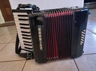 Hohner Accordion Hohnica 1303 12 Bass Entry Level Piano Black Used. Price: $329.99.
