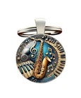 Keychain, Piano Saxophone Bag Jewel And Floor - Musician Gift New. Price: $13.60.