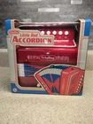 Brand New! Schylling -little Red Accordion, Great Gift Item!. Price: $18.89.